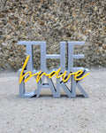 "Brave The Dark" Shelf Sitter