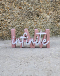 "Infinite" Shelf Sitter
